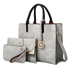 Light gray PU leather 3-piece bag set with tote, chain clutch and small pouch