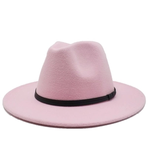 Detailed side view of a pink felt fedora hat featuring a classic black decorative ribbon band