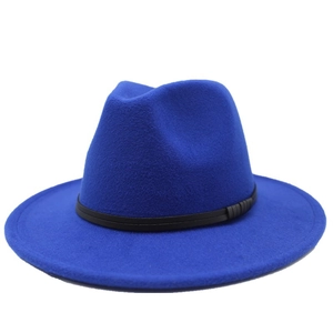 Detail of the royal blue wool fedora hat featuring a stylish black leather decorative band