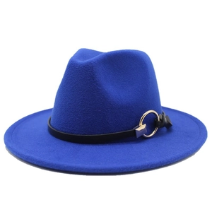 Close-up of cobalt blue fedora hat with black leather band and gold metal ring detail