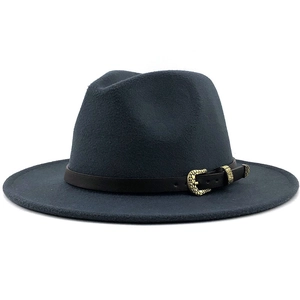 Close-up of wool fedora hat with brown leather band and vintage gold metal buckle detail