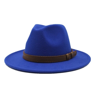 Detail of royal blue wool jazz hat featuring a brown leather band with V-shaped stitching