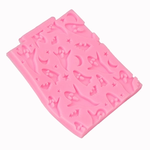 Pink silicone Halloween mold with ghosts, bats, and stars for DIY fondant baking