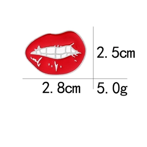 Detailed view of red lip enamel pin with 2.8cm width and 2.5cm height measurements