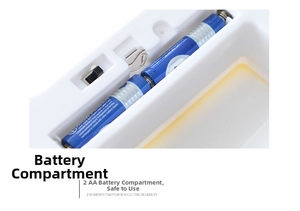 Detailed macro view of the 1.5V AAA battery compartment and black power switch