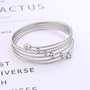Modern silver multi-layer woven wire cable bracelet with polished metal beads for women