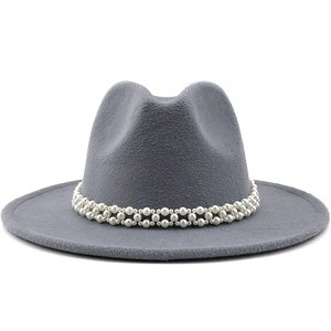 Detailed close-up of dark grey wool fedora hat featuring double-row pearl embellishments