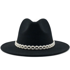 Close-up of black wool fedora featuring elegant double-row pearl beads decoration
