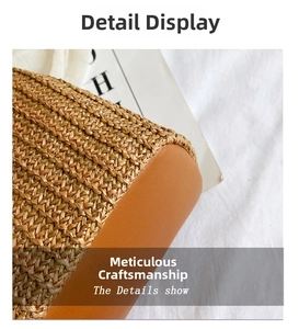 Detailed close-up of woven straw base and smooth brown leather stitching on the bucket bag