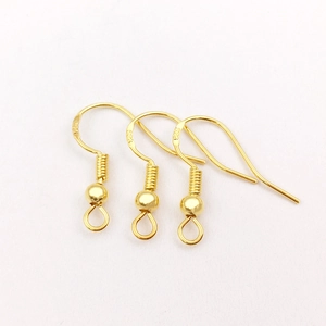 Macro shot of gold-plated S925 sterling silver earring hooks for DIY jewelry making