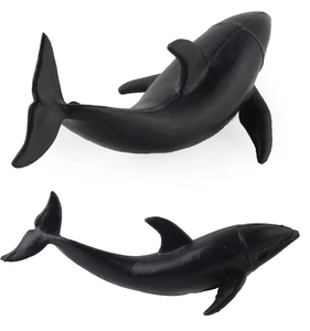 Detailed view of two matte black dolphin figures showing realistic fins and textures