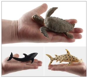 Close-up showing realistic skin textures and sizes of the 5-piece sea animal model set