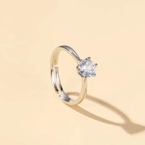 Elegant silver crown ring with six-prong set cubic zirconia and adjustable open band