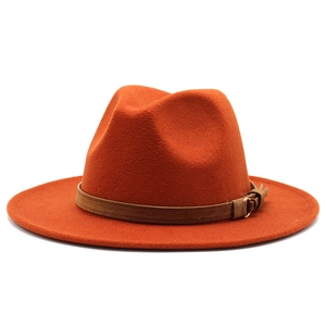 Classic rust red wool felt fedora hat with wide flat brim and brown leather band detail