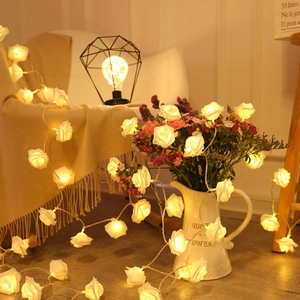 White rose LED string lights with warm glow for Christmas and wedding home decor