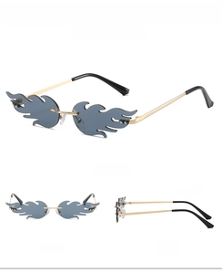 Three views of flame-shaped rimless sunglasses with gold temples and black gray lenses