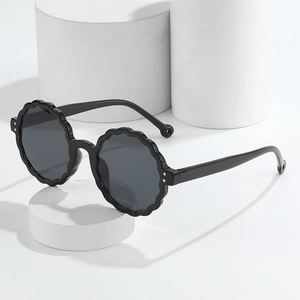 Fashionable round flower wave frame sunglasses with grey lenses for a minimalist look