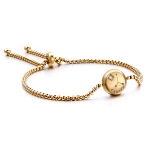 Adjustable gold titanium Cancer zodiac bracelet with engraved coin and sparkling crystal