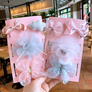 Handmade baby bow headband set with fabric flowers in soft pink and gray pastel colors