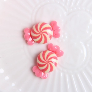 DIY resin candy accessories in pink and white swirl pattern for phone case decoration