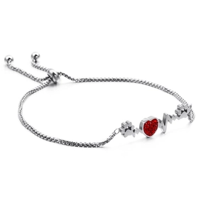 Silver heartbeat bracelet with red rhinestone heart and paw prints in polished steel
