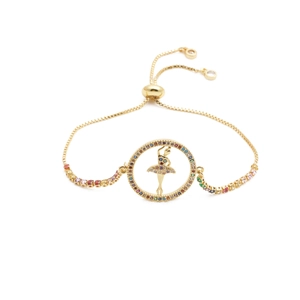 Adjustable gold ballerina bracelet with sparkling colorful zircons on a white background