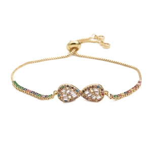 Adjustable gold bracelet with infinity symbol and multi-colored cubic zirconia stones