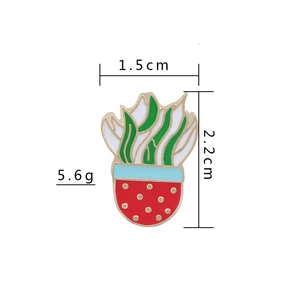 Detail view of cartoon enamel plant brooch with 1.5cm x 2.2cm dimensions and 5.6g weight