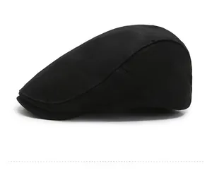 Side view of black twill flat cap showing structured design and premium stitching