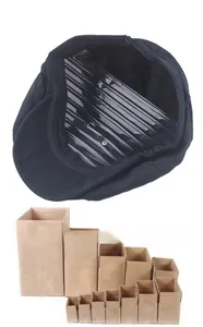 Emballage protecteur pour béret noir en coton avec insert gonflable et boîtes robustes
