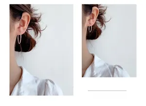 Size comparison between 30mm and 40mm minimalist S925 sterling silver hoop earrings