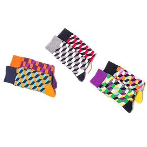 Three pairs of colorful geometric cube pattern cotton crew socks for men in vibrant colors