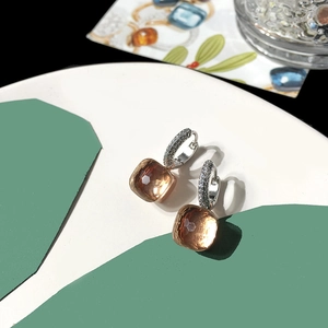 Detail of amber square crystal earring with S925 silver pave setting and faceted stone