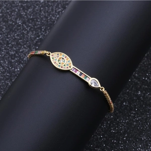 Adjustable evil eye charm bracelet in gold-plated copper with multi-color zircon stones