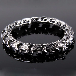 Men's punk style dragon scale steel bracelet in vintage silver finish on black reflection