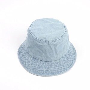 Detail of light blue denim bucket hat with parallel stitching on wide brim