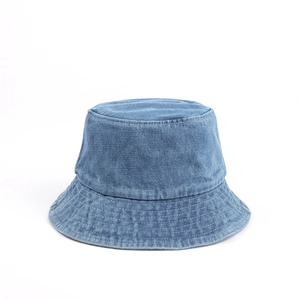 Detailed view of blue denim bucket hat with multiple stitched brim and cotton texture