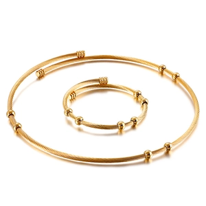 Ensemble collier et bracelet en fil d'acier inoxydable tressé doré à billes