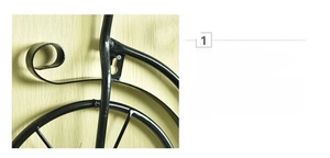 Close-up of welding points and metal structure of vintage bicycle iron wall decor