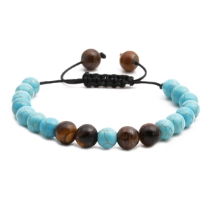 Adjustable woven bracelet with turquoise and tiger eye beads on a white background