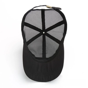 Detail of black mesh baseball cap showing breathable texture and adjustable metal buckle