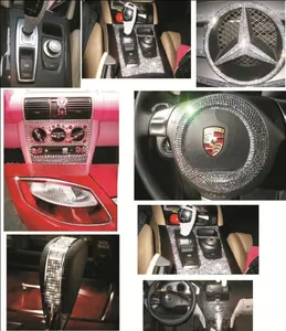 Detailed view of shiny 3mm acrylic rhinestone stickers applied to car interior parts