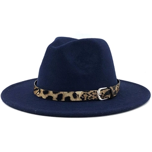 Close-up of navy blue wool fedora featuring leopard print belt and silver metal buckle