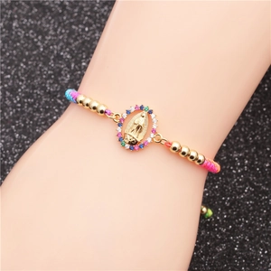 Adjustable woven religious bracelet with Virgin Mary pendant and colorful rhinestones