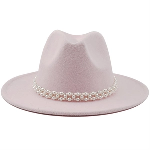 Detail of light pink wool fedora hat featuring elegant double-row white pearl decorative band