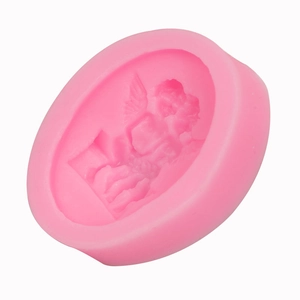 Pink silicone angel mold for DIY fondant cake decorating and handmade soap crafts