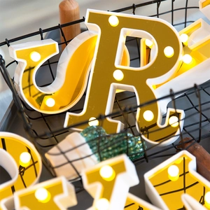 Golden LED letter R marquee lamp with warm lights for romantic birthday decor