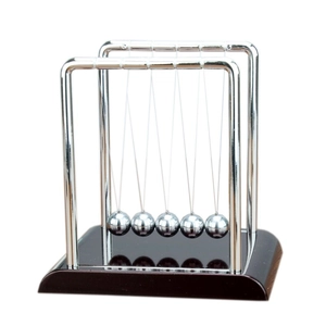 Newton's Cradle physical pendulum with 5 silver metal balls on a dark wood base