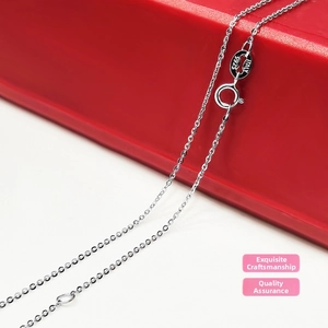Macro shot of S925 and ITALY hallmarks on a sterling silver cable chain spring clasp