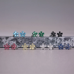 Elegant flower stud earrings set with colorful cubic zirconia in seven various vibrant colors